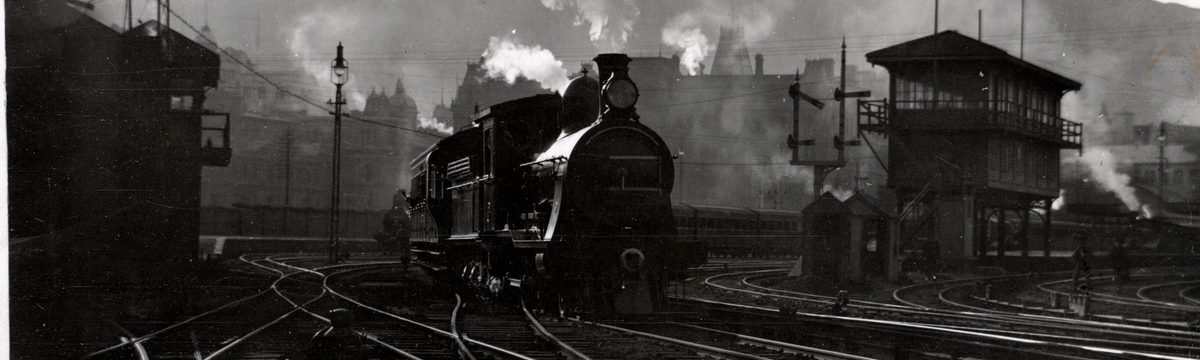 A steam train leaving Cape Town station. Elliot Collection, Western Cape Archives and Records Service.